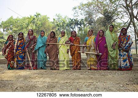 Women from agricultural commune; Kishoreganj, Bangladesh View Large Photo Image Stock Photography - Women from agricultural commune; Kishoreganj, Bangladesh. Fotosearch