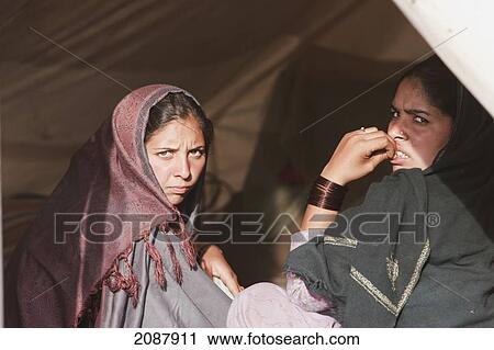 Stock Image - Women In A Relief Camp Tent After The 8 October 2005 Earthquake, Muzaffarabad, Azad Kashmir, Pakistan. Fotosearch