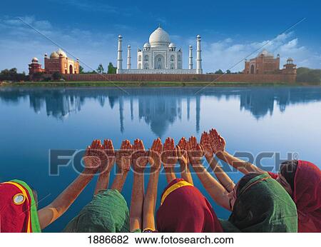 Women In Saris Holding Their Hands Up In Front Of The Taj Mahal View Large Photo Image Stock Image - Women In Saris Holding Their Hands Up In Front Of The Taj Mahal. Fotosearch