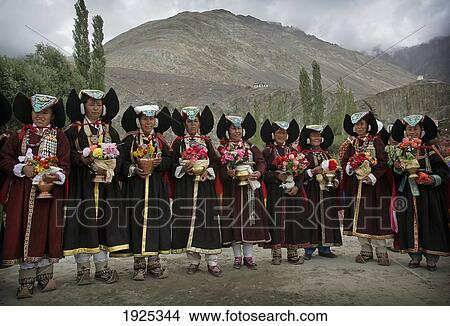 Women In Traditional Dress Standing In Row, Diskyid, Nubra Valley, Leh Ladakh, India View Large Photo Image Picture - Women In Traditional Dress Standing In Row, Diskyid, Nubra Valley, Leh Ladakh, India. Fotosearch