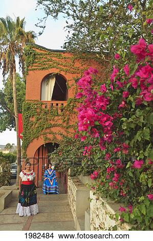Women In Traditional Folkloric Dresses In Downtown In The Early Morning; Todos Santos Baja California Sur Mexico View Large Photo Image Picture - Women In Traditional Folkloric Dresses In Downtown In The Early Morning; Todos Santos Baja California Sur Mexico. Fotosearch