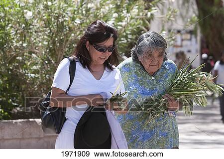 Women Leaving Church On Palm Sunday, San Pedro De Atacama, Antofagasta Region, Chile View Large Photo Image Stock Photo - Women Leaving Church On Palm Sunday, San Pedro De Atacama, Antofagasta Region, Chile. Fotosearch