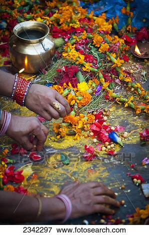 Stock Photo - Women Preparing Floral Decorations; India. Fotosearch