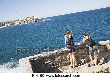 Women Resting On Walk View Large Photo Image Stock Image - Women Resting On Walk. Fotosearch
