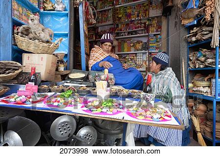 Women Selling Offerings Used In Ancient Inca Rites To Bring Good Luck Or The Good Will Of The Goddess Pachamama (Mother Earth) For Sale At The Mercado De Las Brujas (Witches' Market) On Calle Linares In La Paz., La Paz Department, Bolivia View Large Photo Image Stock Photo - Women Selling Offerings Used In Ancient Inca Rites To Bring Good Luck Or The Good Will Of The Goddess Pachamama (Mother Earth) For Sale At The Mercado De Las Brujas (Witches' Market) On Calle Linares In La Paz., La Paz Department, Bolivia. Fotosearch