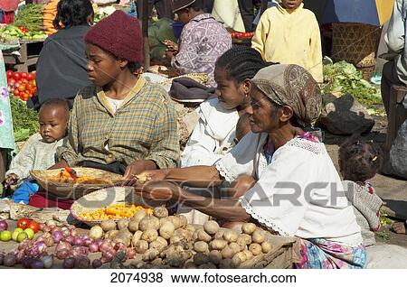 Women Selling Vegetables At The Weekly Market In Fianarantsoa, Madagascar View Large Photo Image Stock Photo - Women Selling Vegetables At The Weekly Market In Fianarantsoa, Madagascar. Fotosearch
