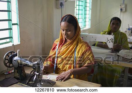 Stock Image - Women sewing; Rangpur, Bangladesh. Fotosearch