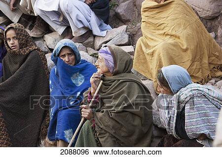 Women Waiting For Aid And Relief Goods Near The Line Of Control, Chakothi, Azad Kashmir, Pakistan View Large Photo Image Stock Photograph - Women Waiting For Aid And Relief Goods Near The Line Of Control, Chakothi, Azad Kashmir, Pakistan. Fotosearch