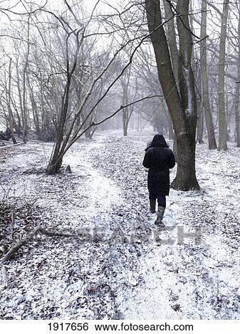 Stock Photograph - Women Walking In Forest, Winter. Fotosearch