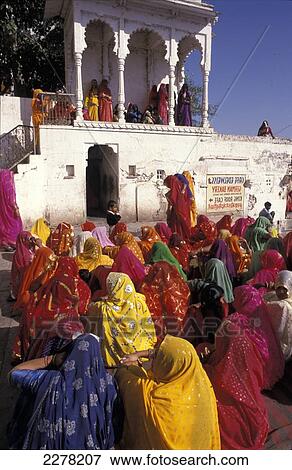 Stock Photo - Women wearing coloured headscarves, Udaipur, Rajasthan, India. Fotosearch