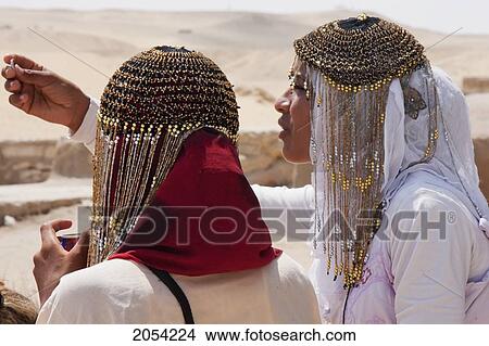 Picture - Women Wearing Head Gear, Giza, Al Jizah, Egypt. Fotosearch