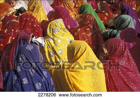 Women wearing multi coloured shawls, Udaipur, Rajasthan, India View Large Photo Image Stock Photograph - Women wearing multi coloured shawls, Udaipur, Rajasthan, India. Fotosearch