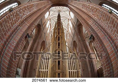 Stock Image - Wooden Altar In St. Peter's Church, Riga, Latvia. Fotosearch