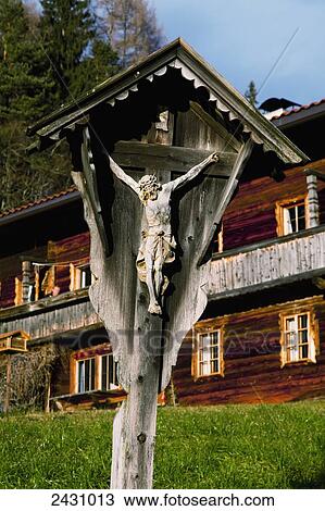 Wooden carving of Christ on the cross; Brixlegg, Austria View Large Photo Image Stock Image - Wooden carving of Christ on the cross; Brixlegg, Austria. Fotosearch