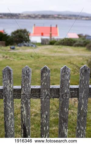 Wooden Fence And Buildings View Large Photo Image Stock Photograph - Wooden Fence And Buildings. Fotosearch