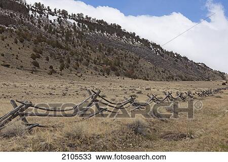 Wooden Fence In A Rural Area With Mountains Near Bozeman; Montana United States Of America View Large Photo Image Stock Image - Wooden Fence In A Rural Area With Mountains Near Bozeman; Montana United States Of America. Fotosearch