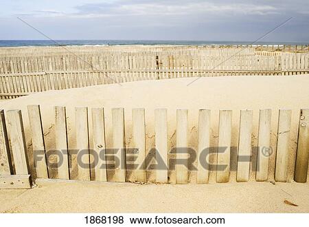 Wooden Fences On The Beach, Cadiz, Spain View Large Photo Image Stock Photo - Wooden Fences On The Beach, Cadiz, Spain. Fotosearch