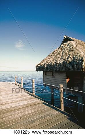 Wooden Hut On Stilts With Jetty In Sea View Large Photo Image Stock Photography - Wooden Hut On Stilts With Jetty In Sea. Fotosearch