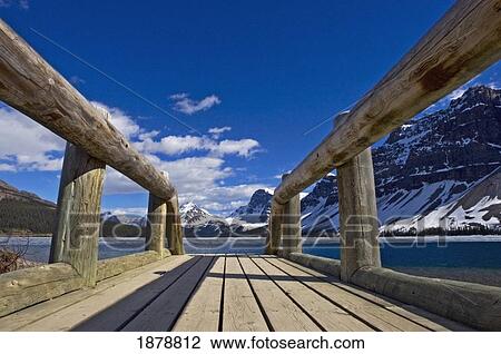 Stock Image - Wooden Jetty On Bow Lake. Fotosearch