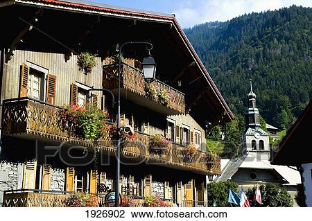 Stock Image - Wooden Lodges And Hotels. Fotosearch