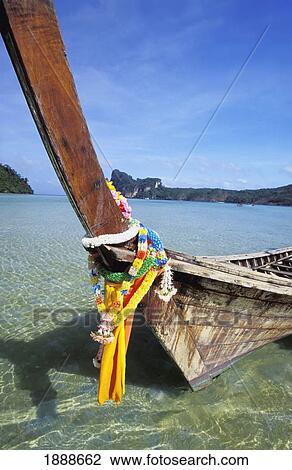 Stock Image - Wooden Long Boat, Low Angle Vie. Fotosearch