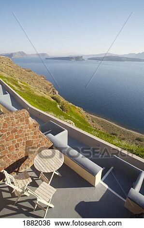 Wooden Table And Chairs On Roof Terrace By Sea View Large Photo Image Stock Photograph - Wooden Table And Chairs On Roof Terrace By Sea. Fotosearch