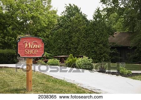 Stock Photography - Wooden Wine Shop Sign At The Entrance Of A Winery; St. Catharines Ontario Canada. Fotosearch