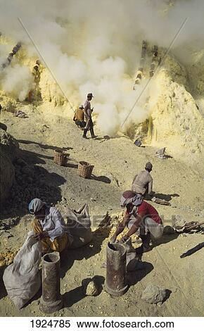 Stock Photography - Workers In A Sulphur Mines, Kaweh Idjen, Java, Indonesia. Fotosearch