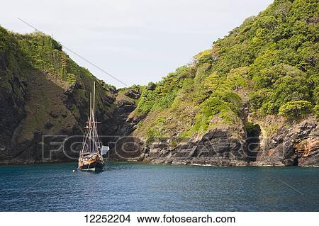 World famous sites for popular dive excursions and live aboard boat trips; Similan and Surin islands, Thailand View Large Photo Image Picture - World famous sites for popular dive excursions and live aboard boat trips; Similan and Surin islands, Thailand. Fotosearch