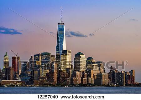 World Trade Center and Lower Manhattan at sunset as viewed from Hoboken, New Jersey; New York City, New York, United States of America View Large Photo Image Stock Image - World Trade Center and Lower Manhattan at sunset as viewed from Hoboken, New Jersey; New York City, New York, United States of America. Fotosearch