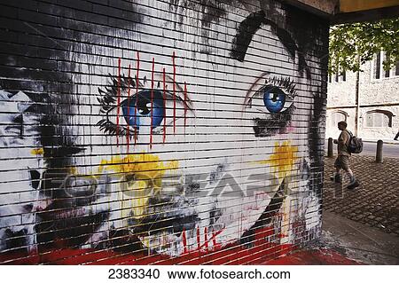 Stock Image - World's top graffiti artists show their legally produced art work, collectively called See No Evil, on the street at Europe's biggest street art festival; Bristol, England. Fotosearch