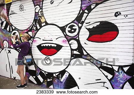 World's top graffiti artists show their legally produced art work, collectively called See No Evil, on the street at Europe's biggest street art festival; Bristol, England View Large Photo Image Stock Photo - World's top graffiti artists show their legally produced art work, collectively called See No Evil, on the street at Europe's biggest street art festival; Bristol, England. Fotosearch
