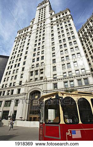 Wrigley Building And Red Trolley, Chicago, Illinois, Usa View Large Photo Image Stock Photo - Wrigley Building And Red Trolley, Chicago, Illinois, Usa. Fotosearch