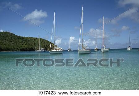 Yachts Anchored In Idyllic Bay View Large Photo Image Stock Image - Yachts Anchored In Idyllic Bay. Fotosearch