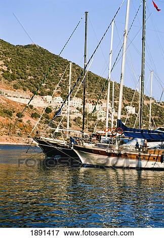 Yachts Anchored Near Sea Shore View Large Photo Image Stock Photo - Yachts Anchored Near Sea Shore. Fotosearch