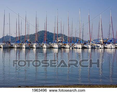 Stock Photograph - Yachts Docked In The Harbor; Gocek, Mugla Province, Turkey. Fotosearch