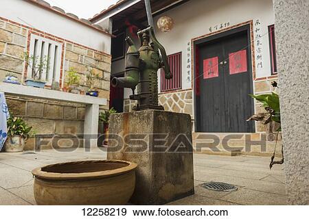 Yard of Taiwanese classical old house with well; Jincheng, Kinmen, Taiwan View Large Photo Image Stock Photo - Yard of Taiwanese classical old house with well; Jincheng, Kinmen, Taiwan. Fotosearch