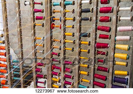 Stock Photo - Yarns at a lurik workshop in Cawas village, Klaten, Central Java, Indonesia. Fotosearch