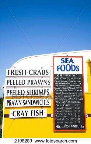 Yellow Caravan That Sells Seafood/ Crab Sandwiches., Blakeney, Norfolk, Uk. View Large Photo Image Stock Photo - Yellow Caravan That Sells Seafood/ Crab Sandwiches., Blakeney, Norfolk, Uk.. Fotosearch