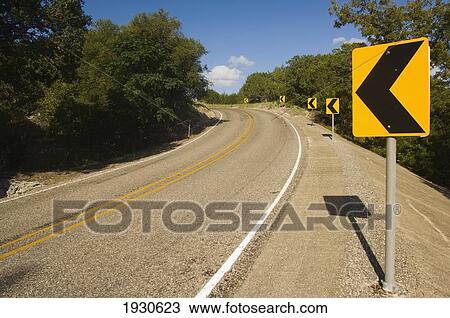 Yellow curve ahead warning signs on Ranch Road 187 heading North in Bandera County, Texas, USA View Large Photo Image Stock Image - Yellow curve ahead warning signs on Ranch Road 187 heading North in Bandera County, Texas, USA. Fotosearch