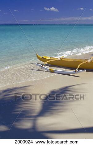 Yellow Outrigger Canoe, White Ama On Shoreline Palm Shadow On Sand Turquoise Ocean View Large Photo Image Picture - Yellow Outrigger Canoe, White Ama On Shoreline Palm Shadow On Sand Turquoise Ocean. Fotosearch