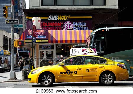 Yellow Taxi In Manhattan, New York, Usa View Large Photo Image Stock Image - Yellow Taxi In Manhattan, New York, Usa. Fotosearch