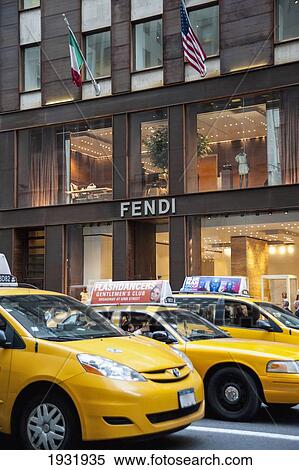 Yellow Taxis In Front Of A Fendi Shop In 5Th Avenue, Midtown Manhattan, New York, Usa View Large Photo Image Stock Photography - Yellow Taxis In Front Of A Fendi Shop In 5Th Avenue, Midtown Manhattan, New York, Usa. Fotosearch
