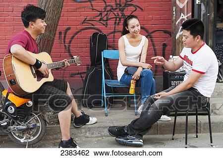 Young adults in 798 Art District; Beijing, China View Large Photo Image Stock Image - Young adults in 798 Art District; Beijing, China. Fotosearch
