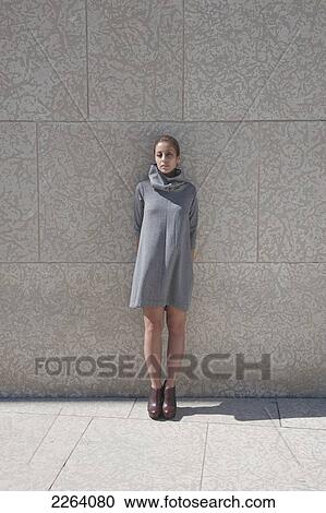 Young Attractive Iranian Woman Wearing Stylish Clothing Against A Concrete Wall; Winnipeg Manitoba Canada View Large Photo Image Stock Image - Young Attractive Iranian Woman Wearing Stylish Clothing Against A Concrete Wall; Winnipeg Manitoba Canada. Fotosearch