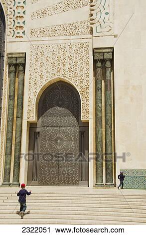 Young boys jumping up steps at Hassan II Mosque; Casablanca, Morocco View Large Photo Image Stock Image - Young boys jumping up steps at Hassan II Mosque; Casablanca, Morocco. Fotosearch