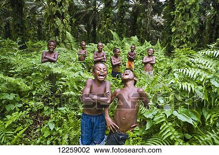 Young boys laughing; West New Britain, Papua New Guinea View Large Photo Image Stock Image - Young boys laughing; West New Britain, Papua New Guinea. Fotosearch
