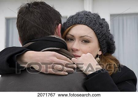 Young Couple Hugging, Whitby, Ontario View Large Photo Image Stock Photo - Young Couple Hugging, Whitby, Ontario. Fotosearch