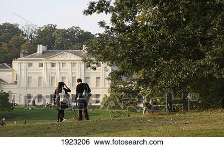 Young Couple Walking On Hampstead Heath Near Kenwood House, Hampstead Heath, London, England View Large Photo Image Stock Photograph - Young Couple Walking On Hampstead Heath Near Kenwood House, Hampstead Heath, London, England. Fotosearch