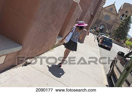 Young Fashionable Woman Walking With Her Ferret By The St Francis Cathedral, Santa Fe, New Mexico, Usa View Large Photo Image Stock Photo - Young Fashionable Woman Walking With Her Ferret By The St Francis Cathedral, Santa Fe, New Mexico, Usa. Fotosearch